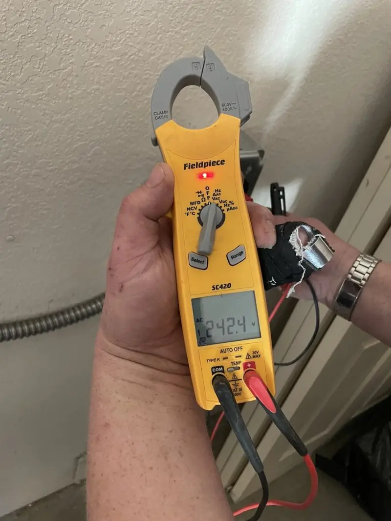 Voltage testing with clamp meter during Hot Tub / Pool Electrical Wiring in Winfield